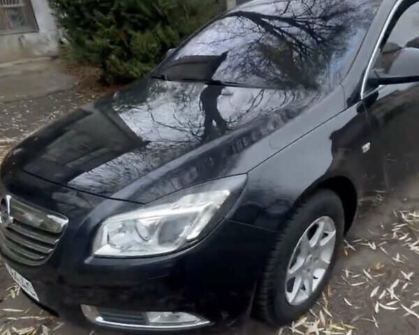 Черный Опель Инсигния, объемом двигателя 1.36 л и пробегом 229 тыс. км за 6750 $, фото 1 на Automoto.ua