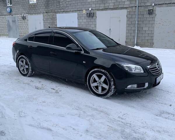 Чорний Опель Інсігнія, об'ємом двигуна 1.96 л та пробігом 300 тис. км за 10177 $, фото 1 на Automoto.ua