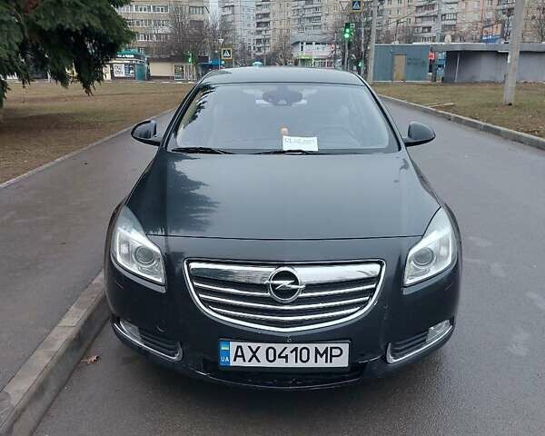 Черный Опель Инсигния, объемом двигателя 1.96 л и пробегом 380 тыс. км за 7500 $, фото 1 на Automoto.ua