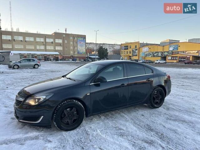 Черный Опель Инсигния, объемом двигателя 1.96 л и пробегом 196 тыс. км за 10999 $, фото 1 на Automoto.ua