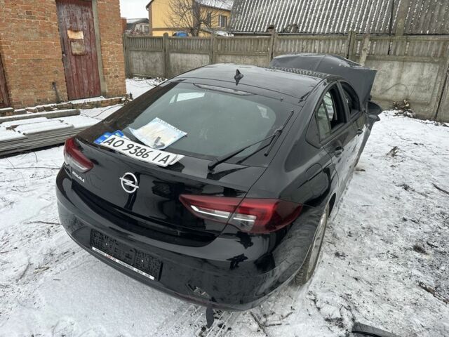 Черный Опель Инсигния, объемом двигателя 2 л и пробегом 220 тыс. км за 3750 $, фото 1 на Automoto.ua