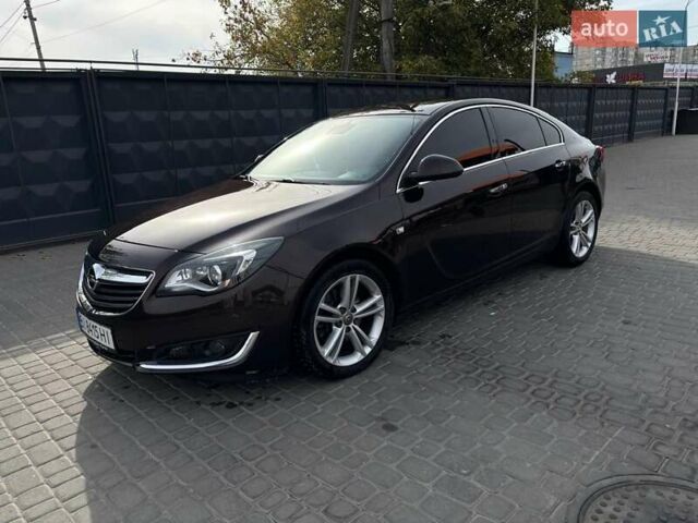Коричневый Опель Инсигния, объемом двигателя 2 л и пробегом 140 тыс. км за 13800 $, фото 1 на Automoto.ua