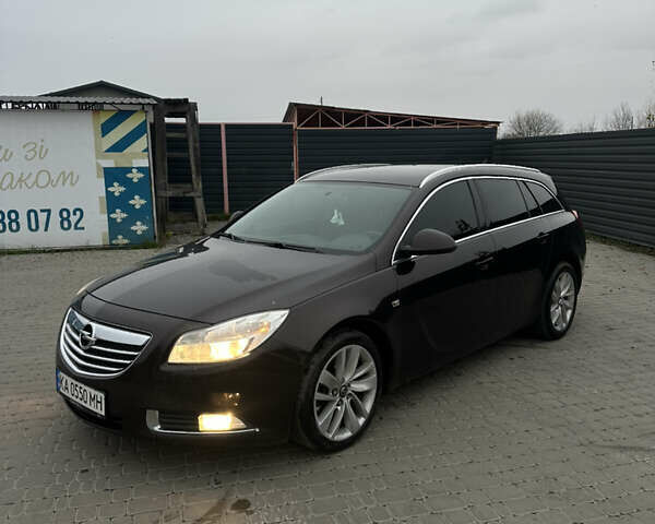 Коричневый Опель Инсигния, объемом двигателя 1.96 л и пробегом 310 тыс. км за 7900 $, фото 1 на Automoto.ua