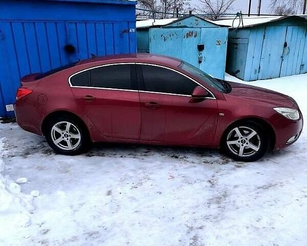 Червоний Опель Інсігнія, об'ємом двигуна 2 л та пробігом 33 тис. км за 7000 $, фото 1 на Automoto.ua