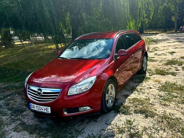 Червоний Опель Інсігнія, об'ємом двигуна 2 л та пробігом 221 тис. км за 7000 $, фото 1 на Automoto.ua