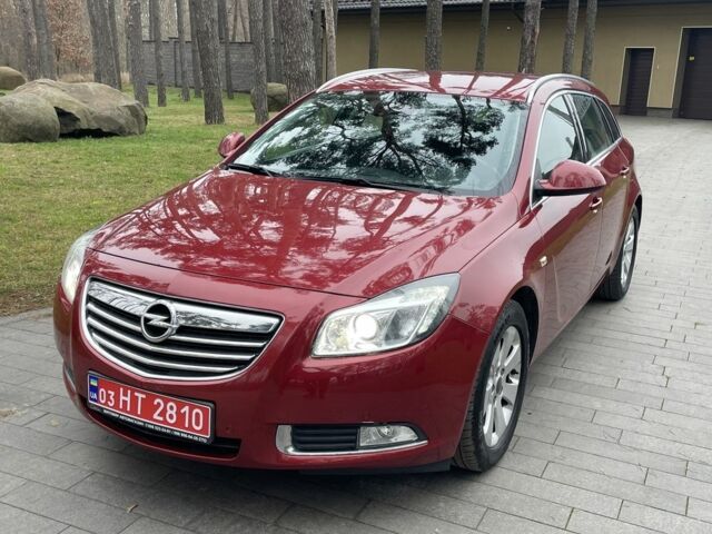 Красный Опель Инсигния, объемом двигателя 2 л и пробегом 210 тыс. км за 6950 $, фото 1 на Automoto.ua