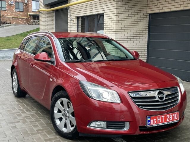 Червоний Опель Інсігнія, об'ємом двигуна 2 л та пробігом 210 тис. км за 6750 $, фото 1 на Automoto.ua