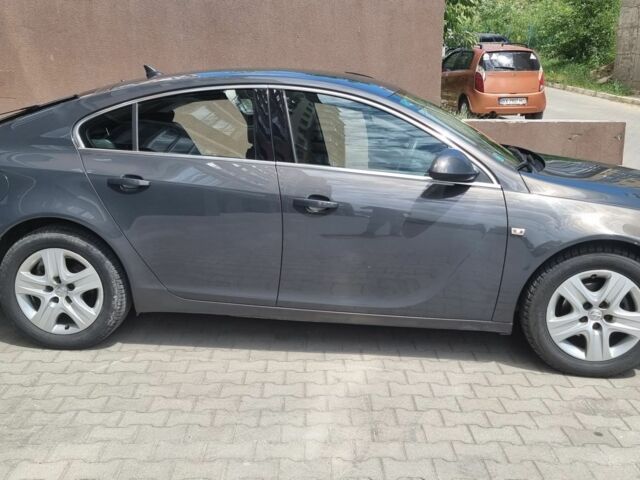 Серый Опель Инсигния, объемом двигателя 2 л и пробегом 188 тыс. км за 8800 $, фото 1 на Automoto.ua