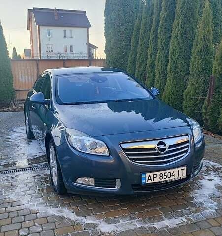 Серый Опель Инсигния, объемом двигателя 1.96 л и пробегом 313 тыс. км за 6700 $, фото 1 на Automoto.ua