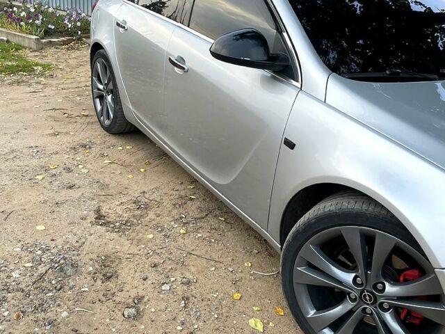 Сірий Опель Інсігнія, об'ємом двигуна 2 л та пробігом 350 тис. км за 7800 $, фото 1 на Automoto.ua