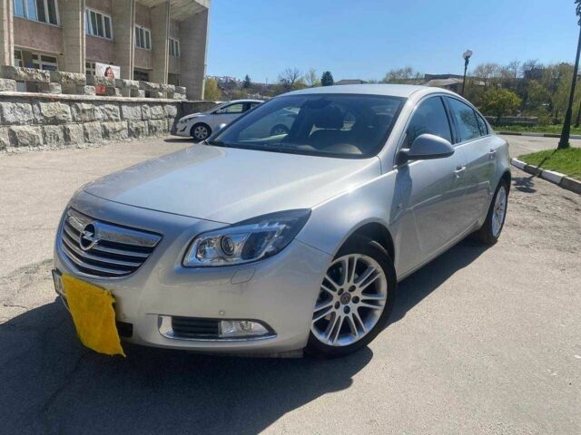 Серый Опель Инсигния, объемом двигателя 2 л и пробегом 22 тыс. км за 11800 $, фото 1 на Automoto.ua