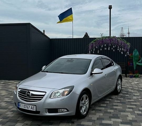 Серый Опель Инсигния, объемом двигателя 1.96 л и пробегом 310 тыс. км за 6900 $, фото 1 на Automoto.ua