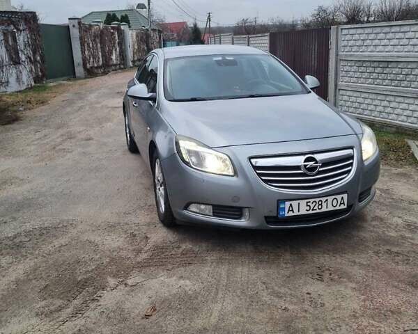 Серый Опель Инсигния, объемом двигателя 1.96 л и пробегом 300 тыс. км за 8000 $, фото 1 на Automoto.ua