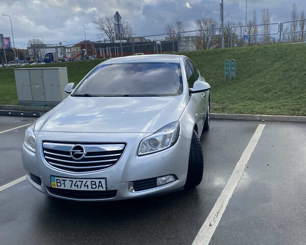 Сірий Опель Інсігнія, об'ємом двигуна 1.96 л та пробігом 205 тис. км за 11200 $, фото 1 на Automoto.ua