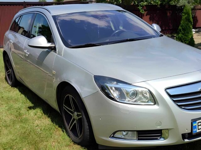 Серый Опель Инсигния, объемом двигателя 2 л и пробегом 243 тыс. км за 6999 $, фото 1 на Automoto.ua