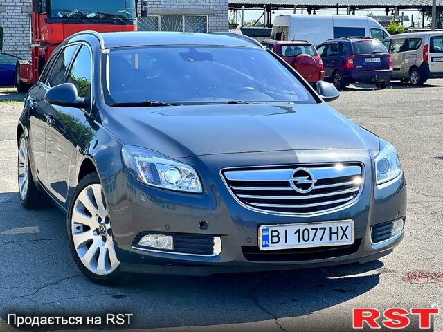 Серый Опель Инсигния, объемом двигателя 2 л и пробегом 255 тыс. км за 6550 $, фото 1 на Automoto.ua