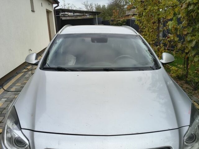 Серый Опель Инсигния, объемом двигателя 1.6 л и пробегом 185 тыс. км за 4500 $, фото 1 на Automoto.ua