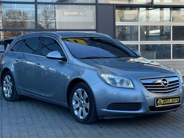 Серый Опель Инсигния, объемом двигателя 2 л и пробегом 309 тыс. км за 7300 $, фото 1 на Automoto.ua