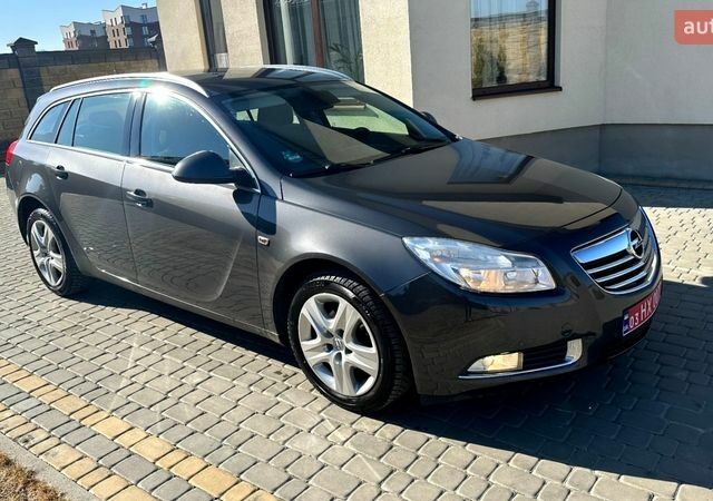 Сірий Опель Інсігнія, об'ємом двигуна 1.8 л та пробігом 197 тис. км за 7400 $, фото 1 на Automoto.ua