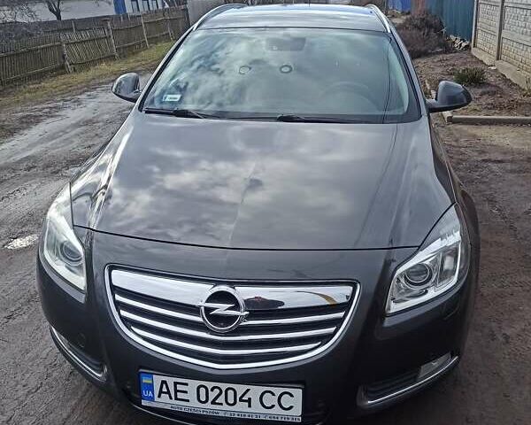 Серый Опель Инсигния, объемом двигателя 2 л и пробегом 185 тыс. км за 10500 $, фото 1 на Automoto.ua
