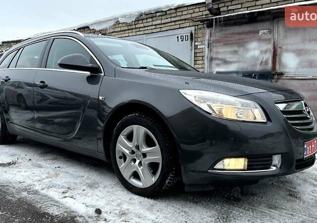 Серый Опель Инсигния, объемом двигателя 1.8 л и пробегом 200 тыс. км за 7650 $, фото 1 на Automoto.ua