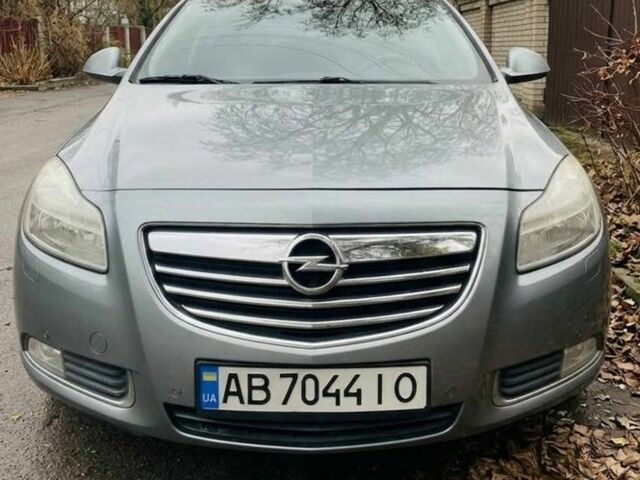 Серый Опель Инсигния, объемом двигателя 1.96 л и пробегом 310 тыс. км за 6000 $, фото 1 на Automoto.ua
