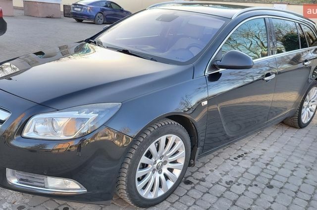 Серый Опель Инсигния, объемом двигателя 2 л и пробегом 321 тыс. км за 7200 $, фото 1 на Automoto.ua