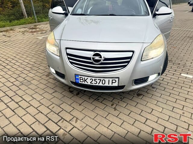 Серый Опель Инсигния, объемом двигателя 2 л и пробегом 270 тыс. км за 6300 $, фото 1 на Automoto.ua