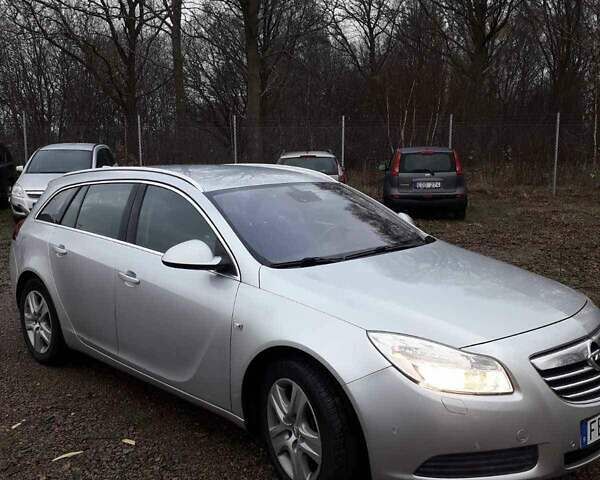 Серый Опель Инсигния, объемом двигателя 1.8 л и пробегом 160 тыс. км за 7500 $, фото 1 на Automoto.ua