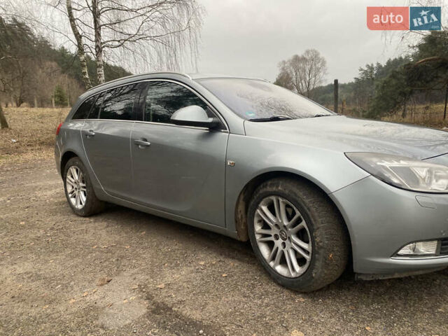 Сірий Опель Інсігнія, об'ємом двигуна 1.96 л та пробігом 203 тис. км за 6999 $, фото 1 на Automoto.ua