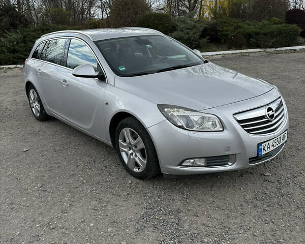 Серый Опель Инсигния, объемом двигателя 2 л и пробегом 260 тыс. км за 6700 $, фото 1 на Automoto.ua