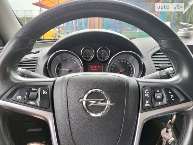 Серый Опель Инсигния, объемом двигателя 2 л и пробегом 265 тыс. км за 6000 $, фото 1 на Automoto.ua