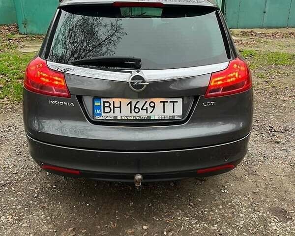 Серый Опель Инсигния, объемом двигателя 2 л и пробегом 299 тыс. км за 6700 $, фото 1 на Automoto.ua