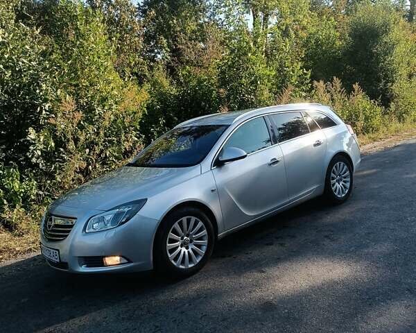 Серый Опель Инсигния, объемом двигателя 1.96 л и пробегом 340 тыс. км за 7200 $, фото 1 на Automoto.ua