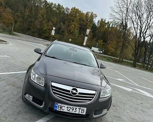 Серый Опель Инсигния, объемом двигателя 1.96 л и пробегом 218 тыс. км за 7600 $, фото 1 на Automoto.ua