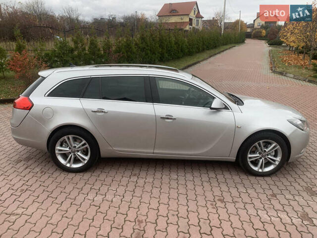 Серый Опель Инсигния, объемом двигателя 1.96 л и пробегом 215 тыс. км за 7750 $, фото 1 на Automoto.ua