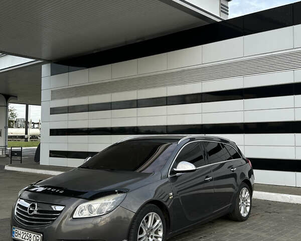 Сірий Опель Інсігнія, об'ємом двигуна 2 л та пробігом 256 тис. км за 7600 $, фото 1 на Automoto.ua