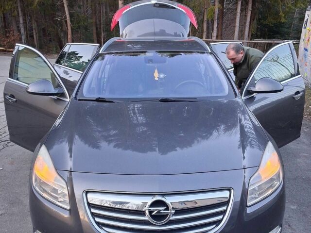 Сірий Опель Інсігнія, об'ємом двигуна 2 л та пробігом 2 тис. км за 7000 $, фото 1 на Automoto.ua