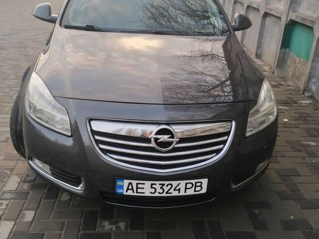 Серый Опель Инсигния, объемом двигателя 2 л и пробегом 318 тыс. км за 7800 $, фото 1 на Automoto.ua
