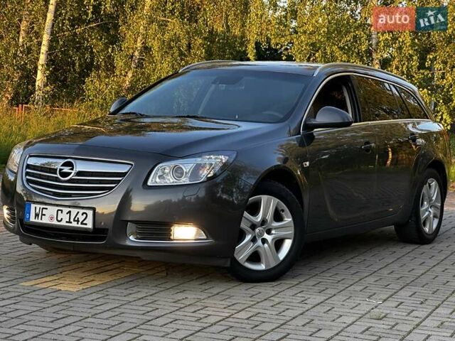 Сірий Опель Інсігнія, об'ємом двигуна 1.96 л та пробігом 217 тис. км за 7950 $, фото 1 на Automoto.ua
