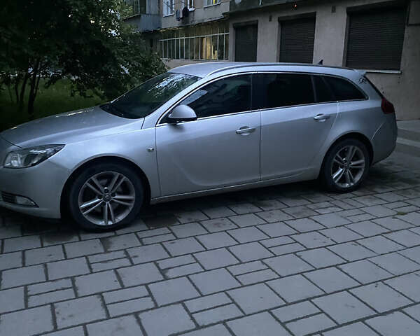 Сірий Опель Інсігнія, об'ємом двигуна 1.96 л та пробігом 347 тис. км за 8500 $, фото 1 на Automoto.ua