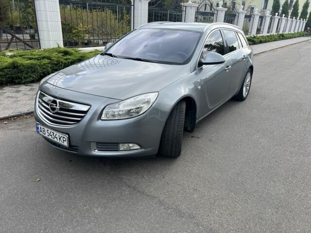Серый Опель Инсигния, объемом двигателя 2 л и пробегом 233 тыс. км за 8572 $, фото 1 на Automoto.ua