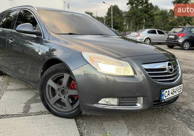Сірий Опель Інсігнія, об'ємом двигуна 2 л та пробігом 288 тис. км за 7999 $, фото 1 на Automoto.ua