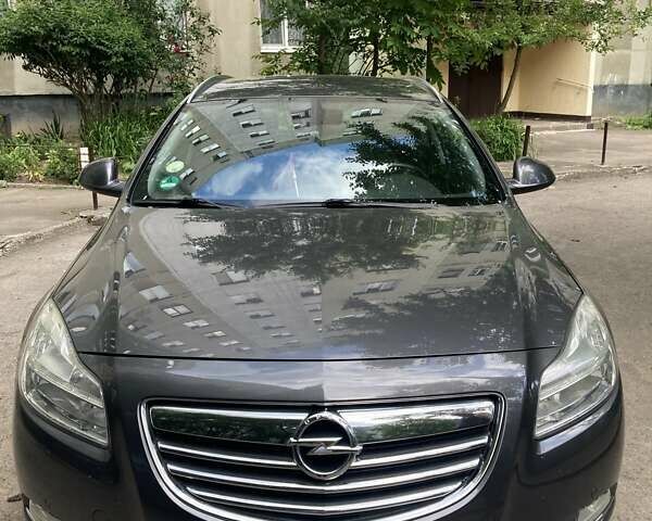 Сірий Опель Інсігнія, об'ємом двигуна 1.96 л та пробігом 232 тис. км за 8990 $, фото 1 на Automoto.ua