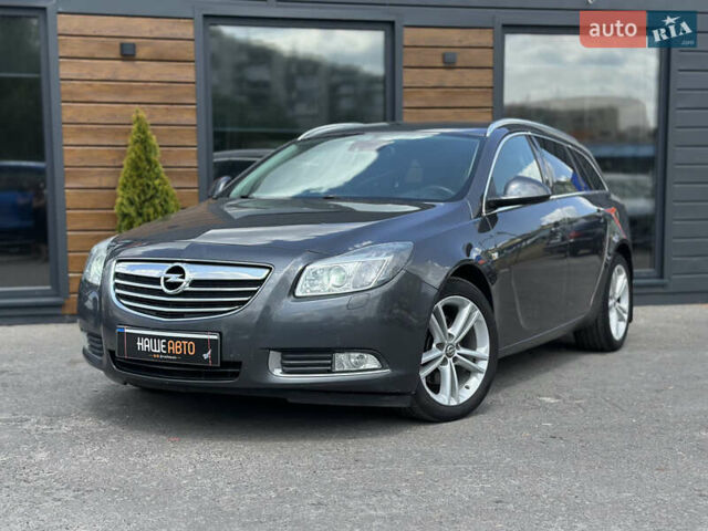 Сірий Опель Інсігнія, об'ємом двигуна 2 л та пробігом 270 тис. км за 7800 $, фото 1 на Automoto.ua