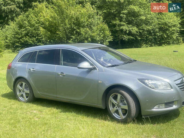 Серый Опель Инсигния, объемом двигателя 2 л и пробегом 250 тыс. км за 9500 $, фото 1 на Automoto.ua