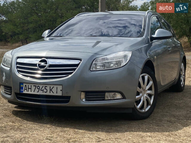 Серый Опель Инсигния, объемом двигателя 2 л и пробегом 338 тыс. км за 8100 $, фото 1 на Automoto.ua