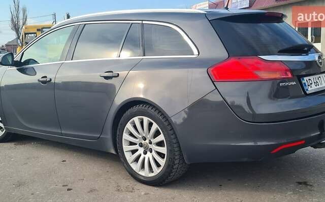 Сірий Опель Інсігнія, об'ємом двигуна 2 л та пробігом 225 тис. км за 8899 $, фото 1 на Automoto.ua