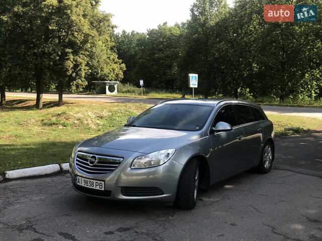 Серый Опель Инсигния, объемом двигателя 2 л и пробегом 174 тыс. км за 7800 $, фото 1 на Automoto.ua