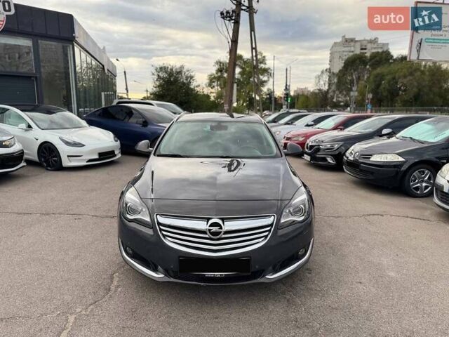 Сірий Опель Інсігнія, об'ємом двигуна 1.96 л та пробігом 245 тис. км за 8499 $, фото 1 на Automoto.ua